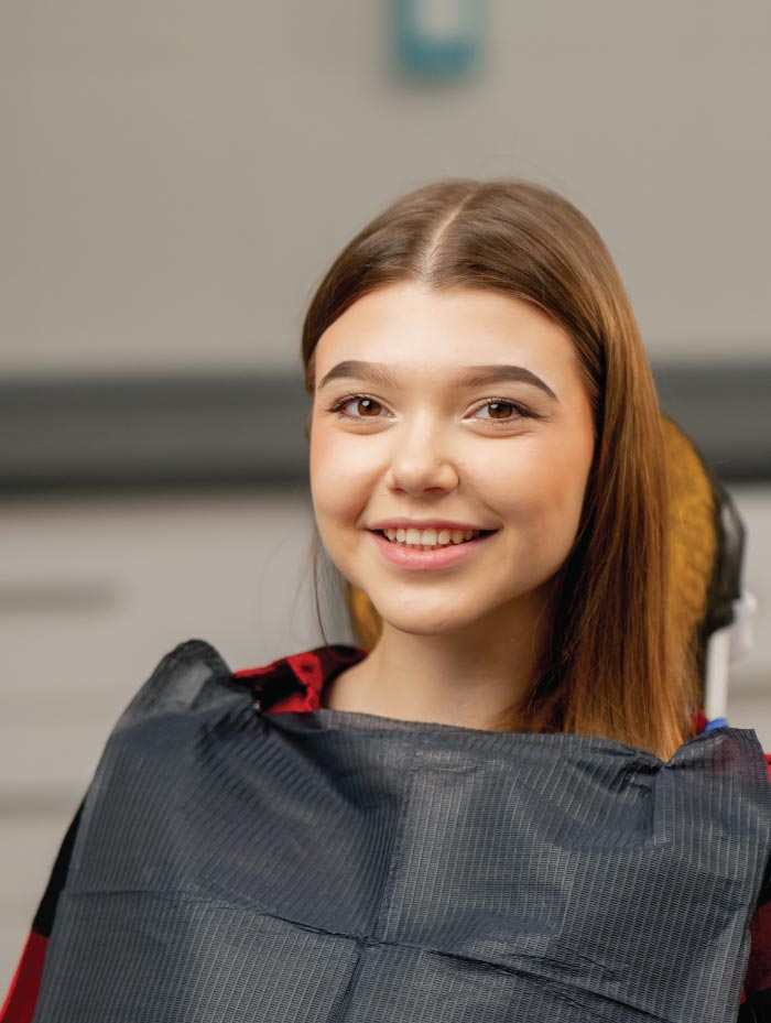 smiling dental bridge patient 
